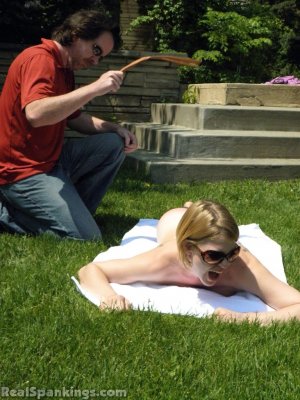 Real Spankings - Lily Strapped For Sunbathing Naked - image 6