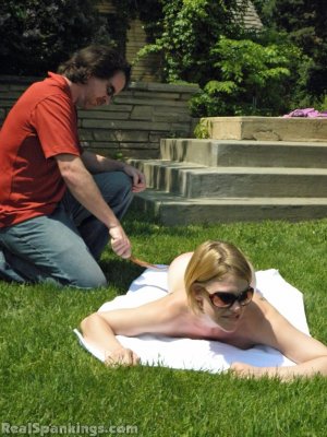 Real Spankings - Lily Strapped For Sunbathing Naked - image 12