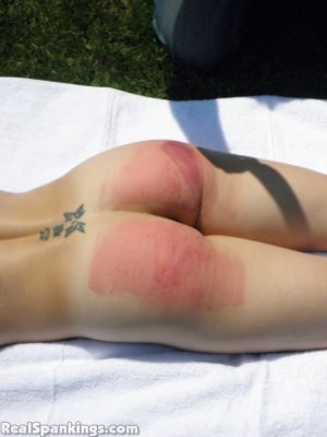 Real Spankings - Lily Strapped For Sunbathing Naked - image 18