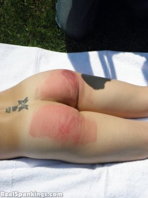 Real Spankings - Lily Strapped For Sunbathing Naked - image 8