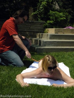 Real Spankings - Lily Strapped For Sunbathing Naked - image 10