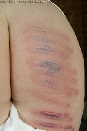 Real Spankings Institute - Lori Receives A Severe Caning Part 1 - image 4