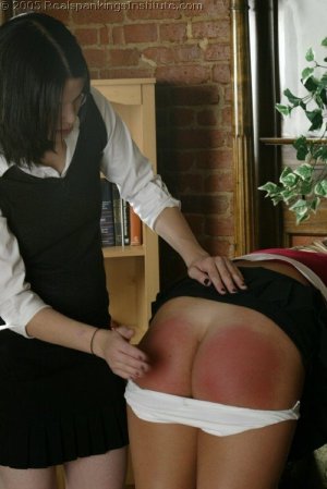 Real Spankings Institute - Riley Spanked In The Library - image 3