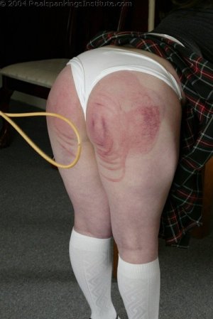 Real Spankings Institute - Lady D Uses The Paddle And The Cane - image 1