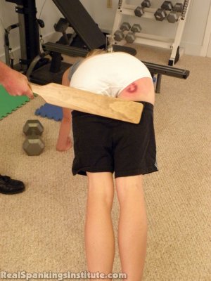 Real Spankings Institute - Monica Is Paddled For Poor Gym Performance - image 10