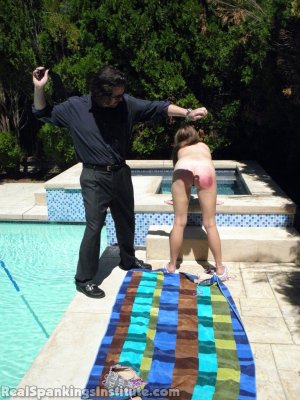 Real Spankings Institute - Riley Caught Sunbathing Topless (part 1) - image 5