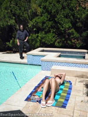 Real Spankings Institute - Riley Caught Sunbathing Topless (part 1) - image 2