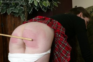 Spanking Bailey - A Hard Caning For Bailey - image 7